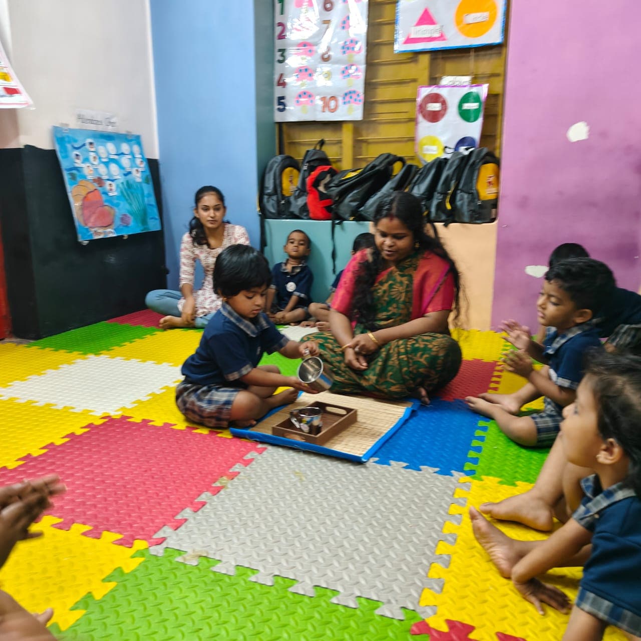 Children engaged in Montessori classroom activities